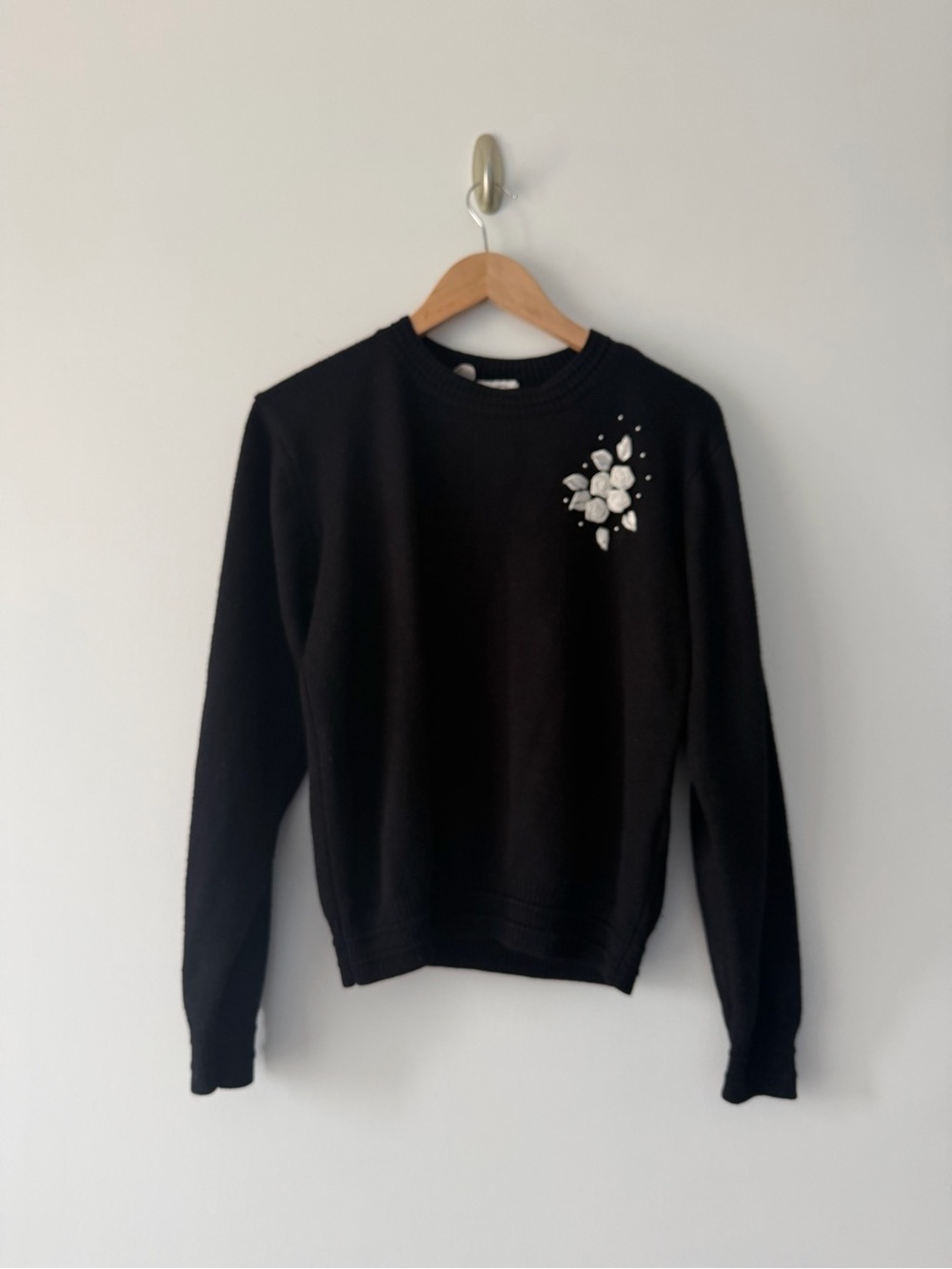Black crew neck with hand embroidered flowers